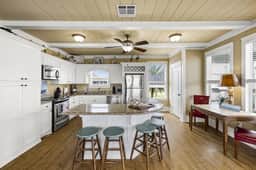Tiki Bar~Golf Cart~BBQ~ExpansiveDecks~Beach Access - Image 2
