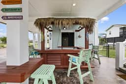 Tiki Bar~Golf Cart~BBQ~ExpansiveDecks~Beach Access - Image 4